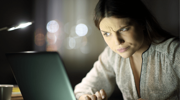 Woman look confused at screen
