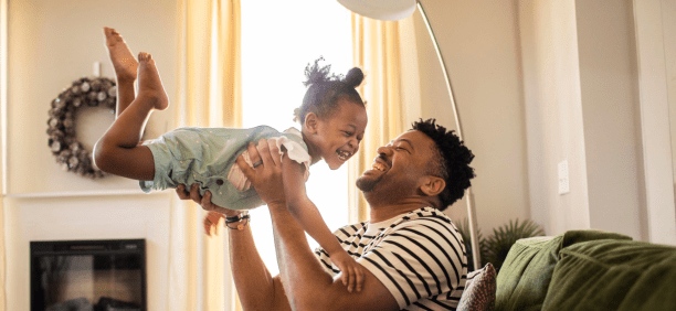 Dad plays with daughter