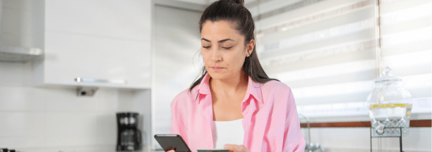 Woman looking at medical bills