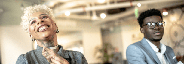 Two employees celebrate