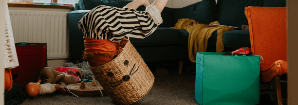 Child plays in basket